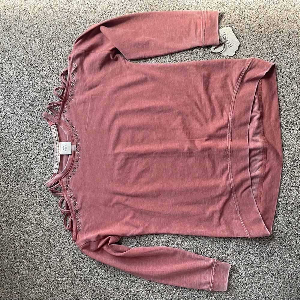 Dusty rose cold shoulder top with cute beading detail.